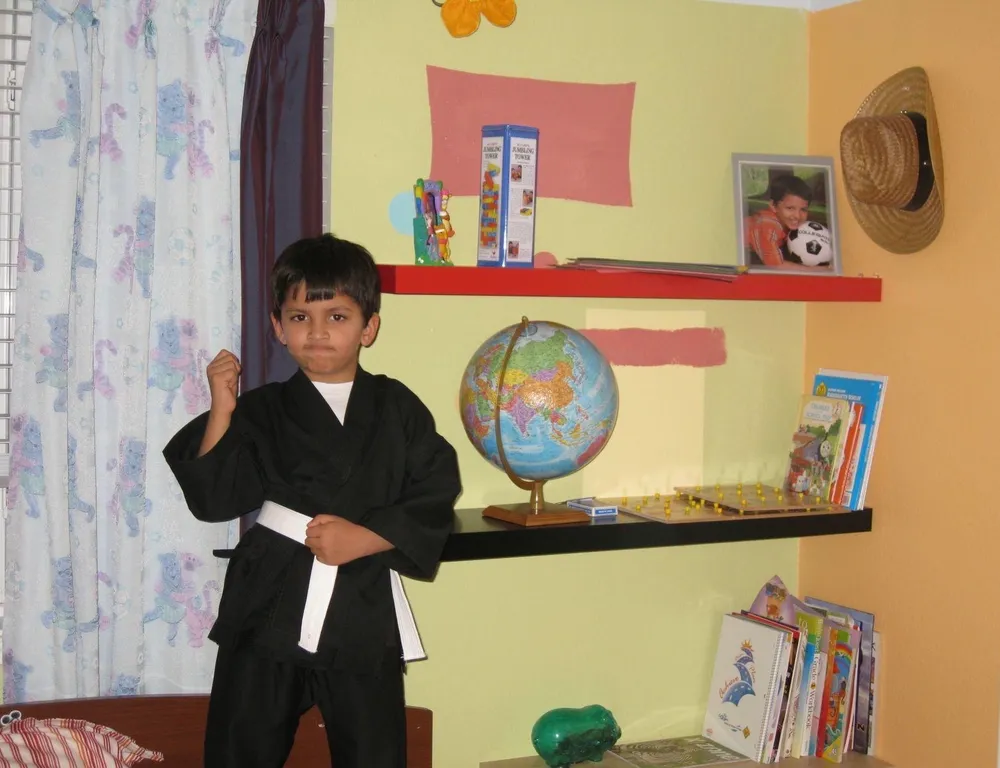 Abhay as a kid in a karate gi